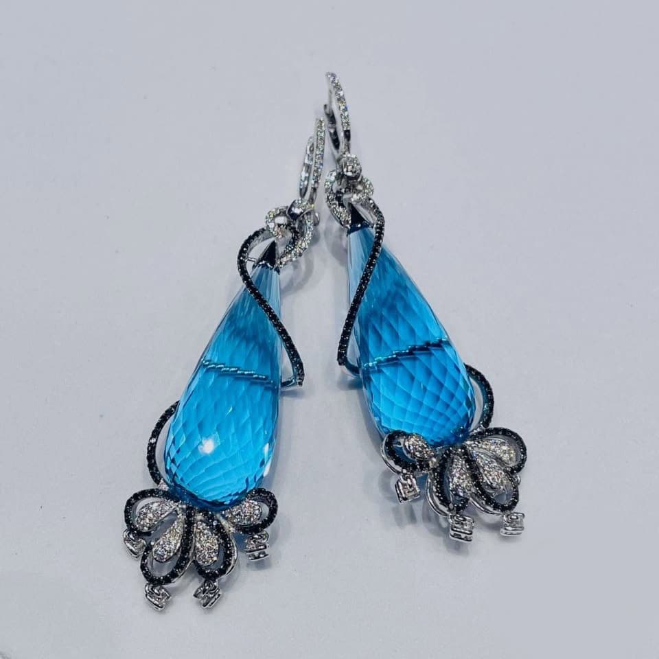 Elegant drop earrings with blue sapphires