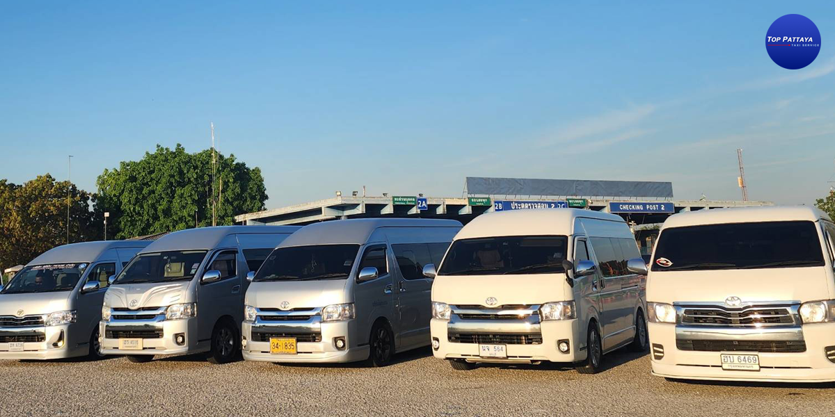 White VIP vans photographed for private group transfers