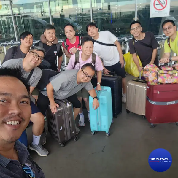 Happy group utilizing Bangkok to Pattaya taxi service from BKK airport