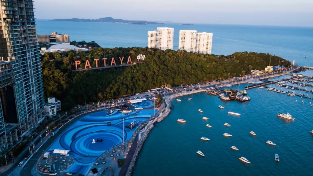 High-angle view of the iconic 'PATTAYA city' sign on Pratumnak Hill.