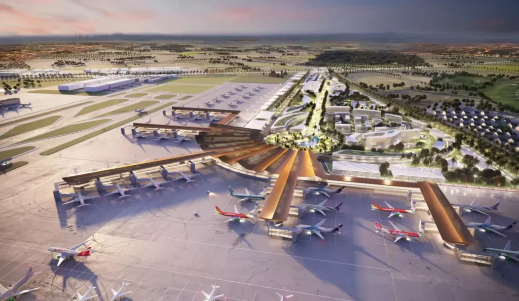 Architectural 3D rendering of the major expansion project for U-Tapao Rayong Pattaya International Airport, showcasing a modern terminal design with multiple airplanes.