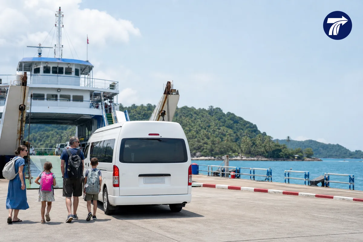 Group following ferry staff instructions during a Koh Chang transfer